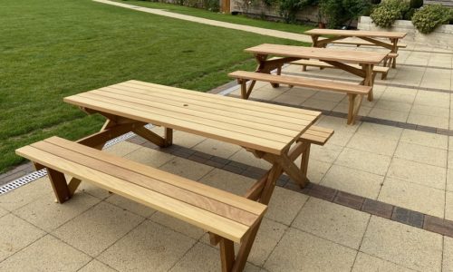 Iroko hardwood X-Frame Picnic Tables. Grange Farm Centre.