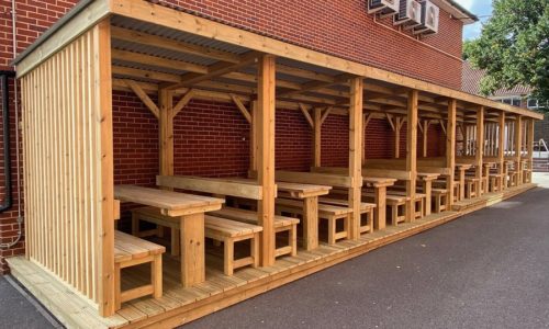 Outdoor Shelter with bay seating. All Hallows School , Farnham.