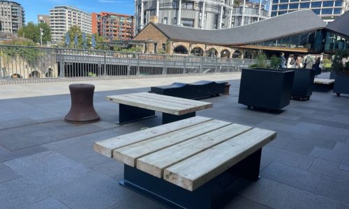Podium benches. Uniqlo Coal Drops Yard, London.